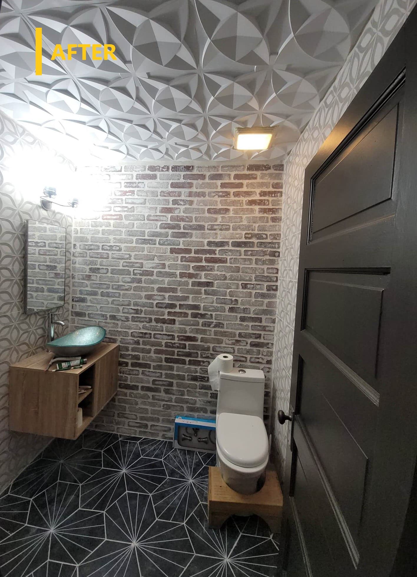 Refreshed hall bathroom with brick-pattern tile and vessel sink vanity